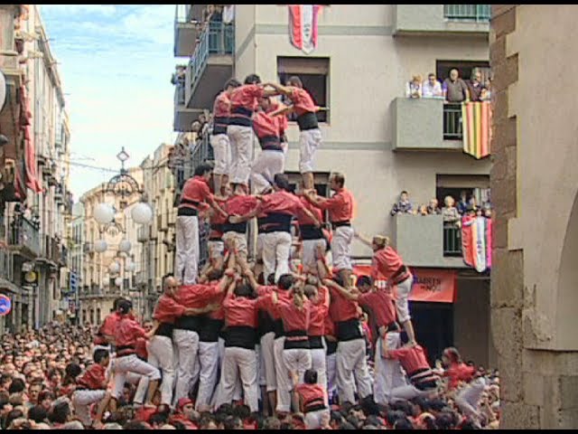 veleta de una torre con forma humana o de animal